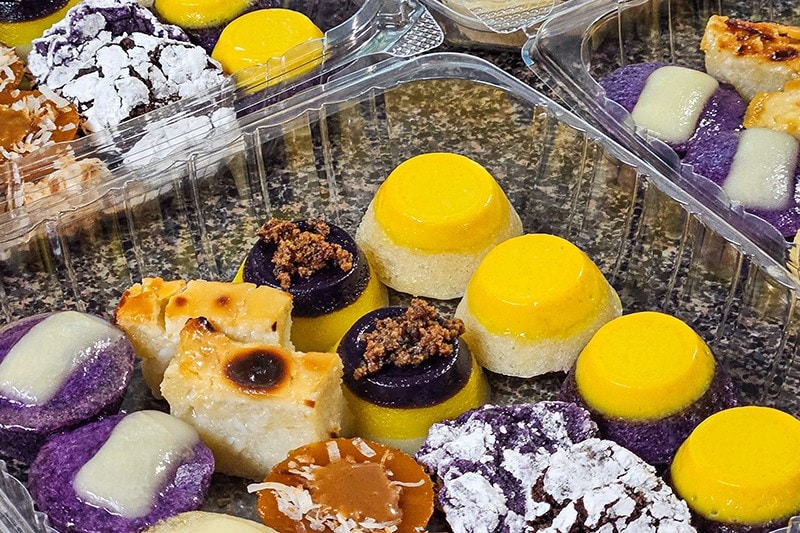 Assorted kakanin in plastic containers. Assorted kakanin in plastic containers.
