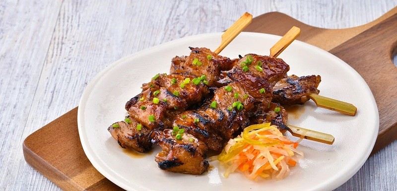 Plant-based barbecue with atchara on the side. Plant-based barbecue with atchara on the side.