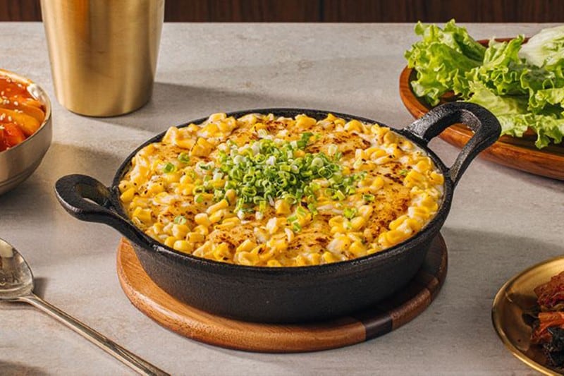 Korean corn cheese in an iron skillet. Korean corn cheese in an iron skillet.