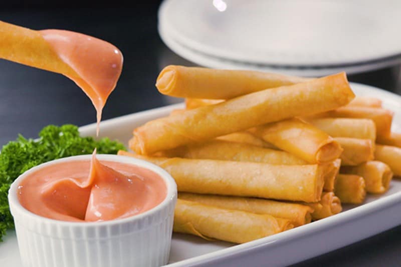 Fried cheese sticks with a mayo-ketchup dip. Fried cheese sticks with a mayo-ketchup dip.