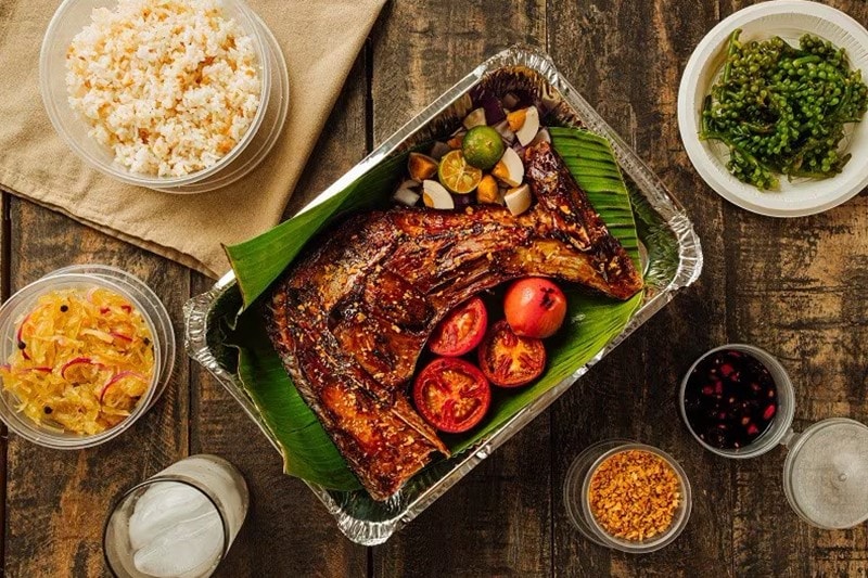 Inihaw na tuna panga in a foil tray. Inihaw na tuna panga in a foil tray.