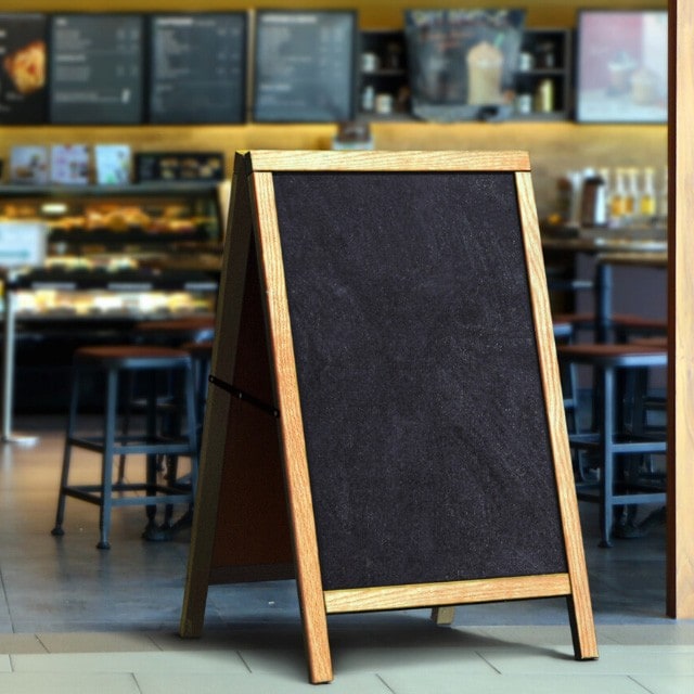 Empty chalkboard in front of restaurant Empty chalkboard in front of restaurant