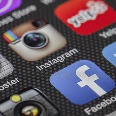 Image of phone screen with social media app icons Image of phone screen with social media app icons