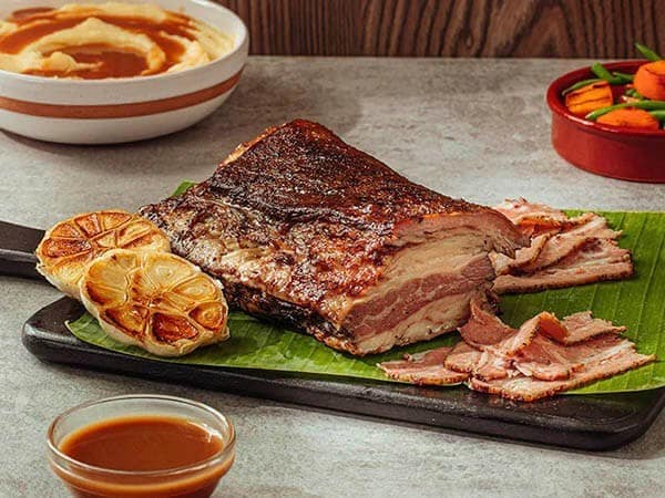 Lechon baka is a reliable alternative to pricey steaks. Lechon baka is a reliable alternative to pricey steaks.
