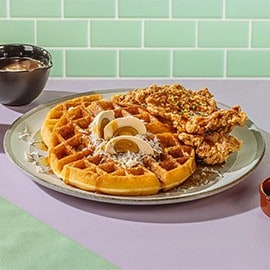 Sinigang fried chicken served with bibingka waffles. Sinigang fried chicken served with bibingka waffles.
