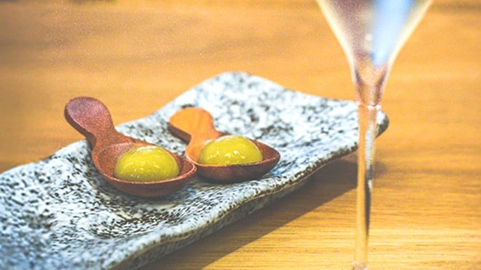 Two servings of spherical olives.