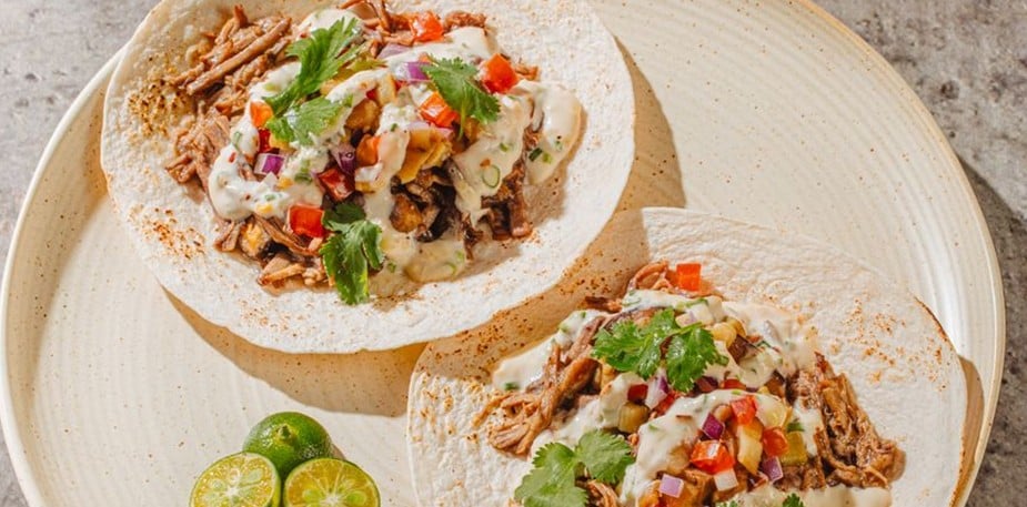 Beef pares tacos topped with garlic-spring onion mayonnaise.