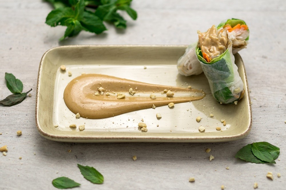 A plate of Vietnamese spring rolls (gỏi cuốn) with peanut sauce A plate of Vietnamese spring rolls (gỏi cuốn) with peanut sauce