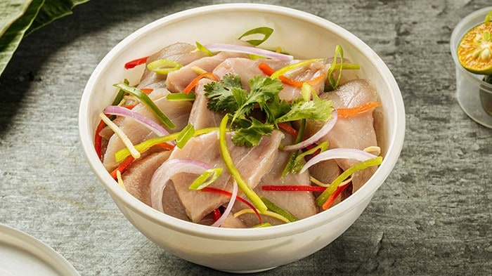 Kilawin na tanigue in a white bowl. 