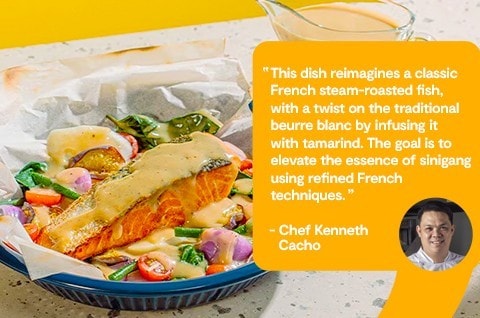 Salmon en Papilotte with Sinigang Vegetables with beurre blanc on the side.