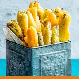 Vegetable fritters with a side of salted egg sauce. 