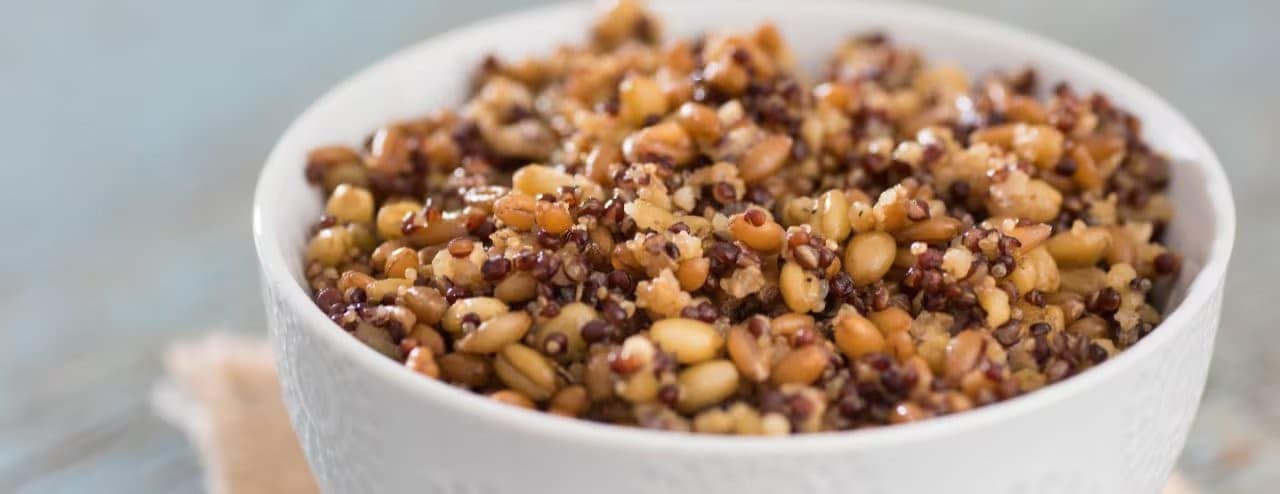 A bowl of mixed cooked ancient grains. A bowl of mixed cooked ancient grains.