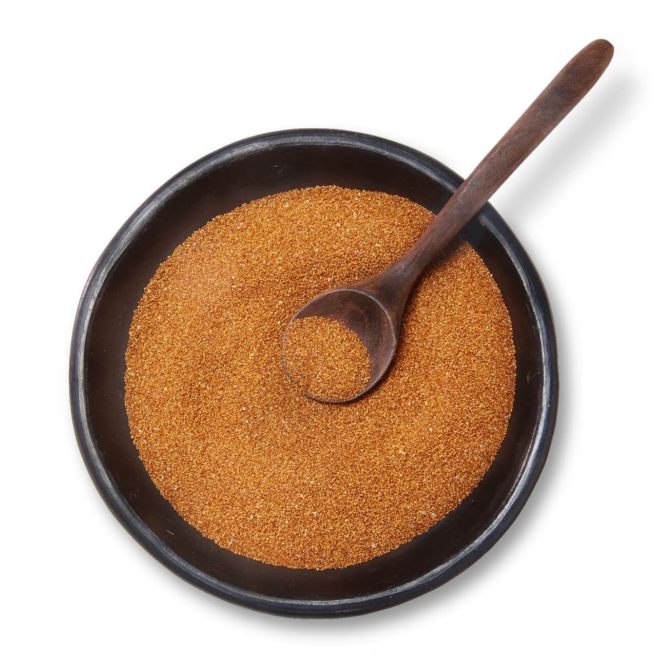 A bowl of uncooked teff. A bowl of uncooked teff.