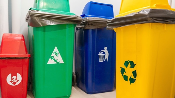 Color-coded waste segregation bins.