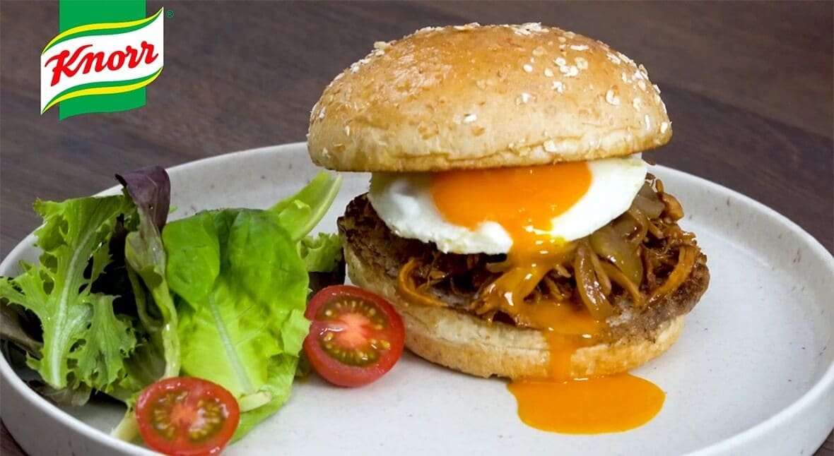 burger with vegetables on a plate
