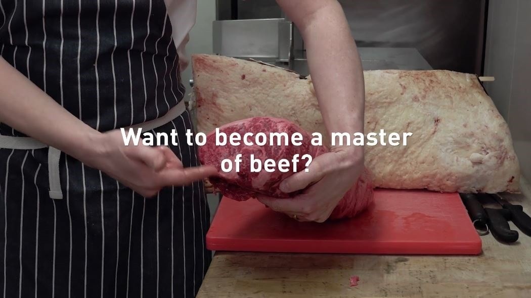 Chef with raw meat and text that reads: Want to become a master of beef?
