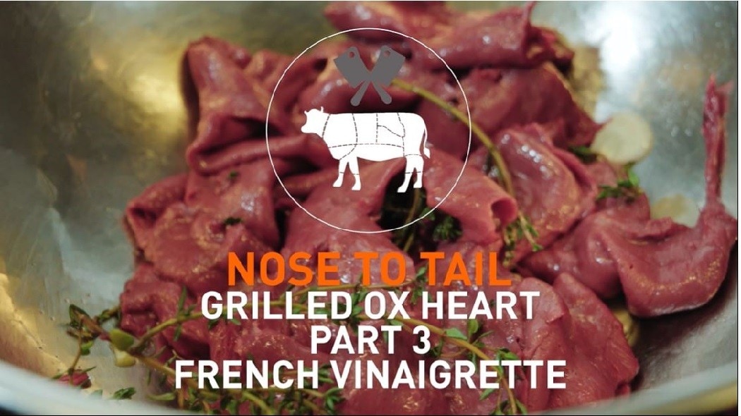 Bowl of meat with text that reads: Nose to tail - Grilled ox heart part 3 - French vinaigrette.