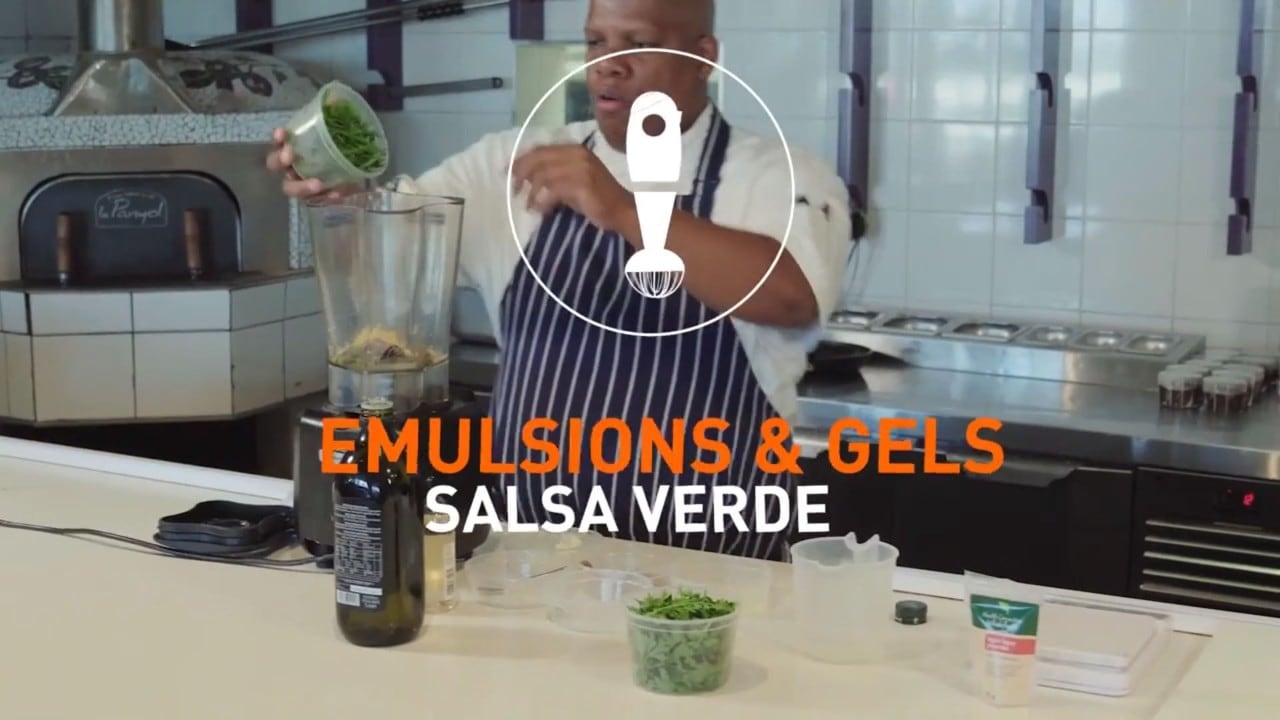 Chef working with food with caption that reads: Emulsions and Gels: Salsa Verde