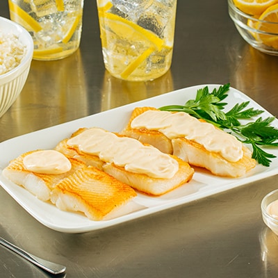 Creamy Baked Fish with Garlic Sauce Creamy Baked Fish with Garlic Sauce