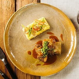 Braised Beef Shortribs with Gremolata served with Saffron Braised Beef Shortribs with Gremolata served with Saffron