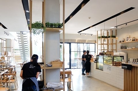 A coffee shop with wood interior fittings and furnishings. A coffee shop with wood interior fittings and furnishings.