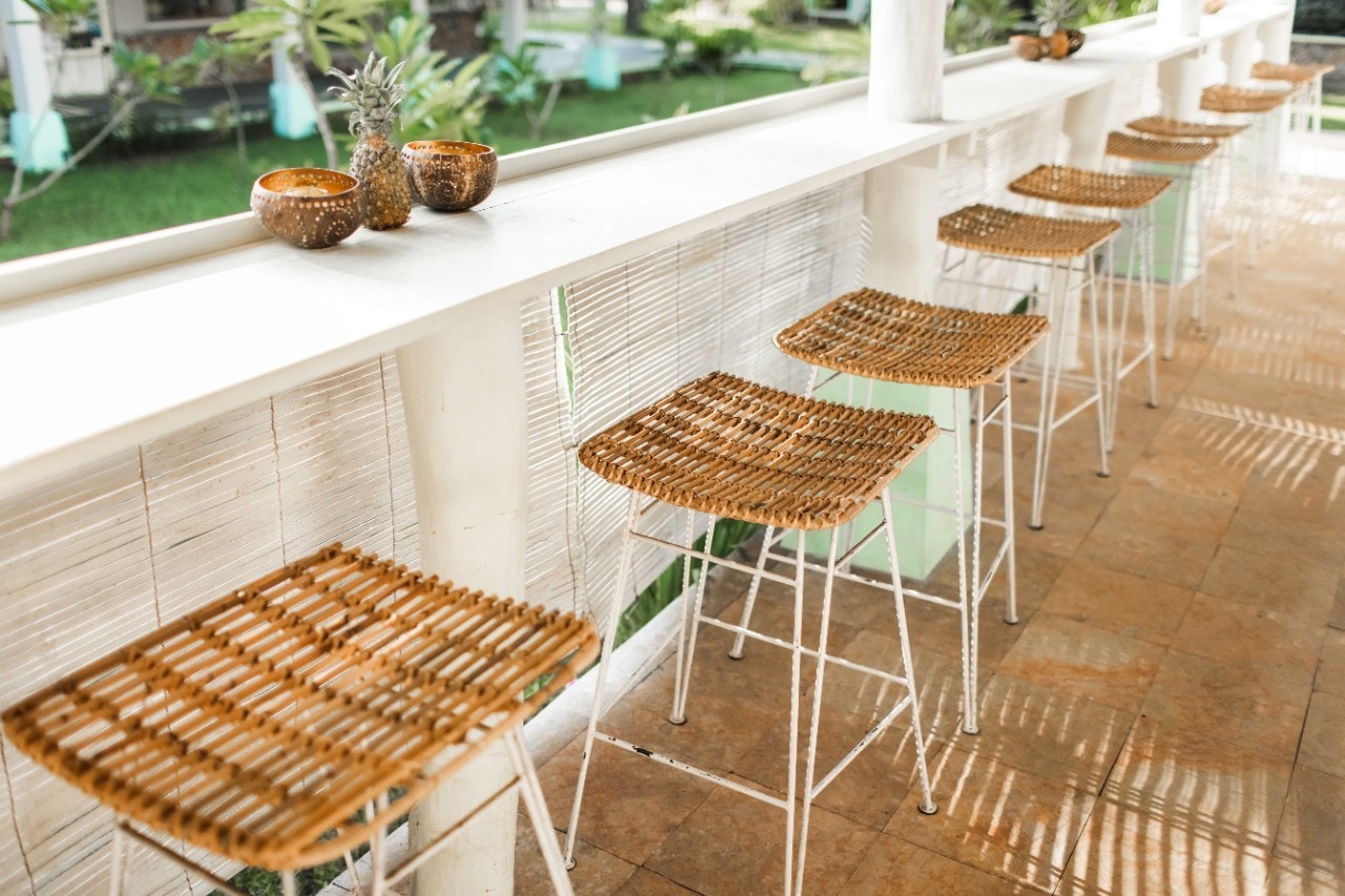 An outdoor bar with wicker chairs. An outdoor bar with wicker chairs.