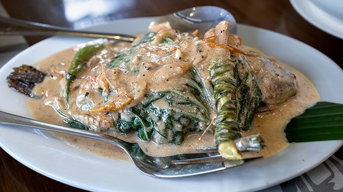 Sinanglay made with tilapia in a white platter.