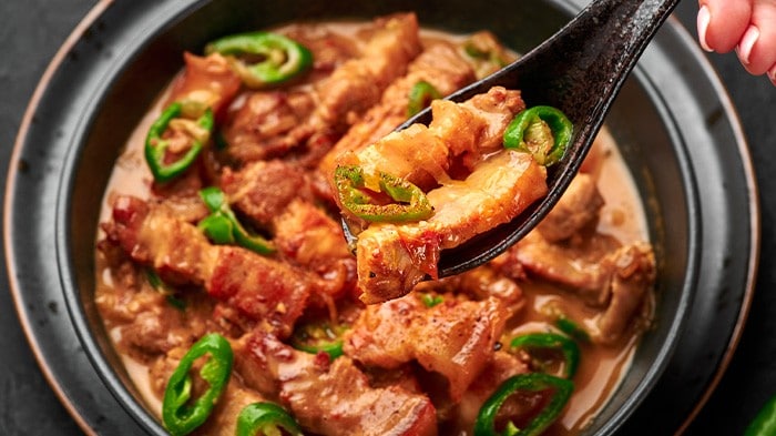 Bicol express made with chopped pork belly and chilies.