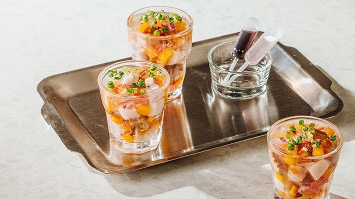 Sinuglaw jelly cups topped with salsa.