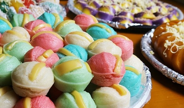 An assortment of Filipino kakanin, including puto and kutsinta. An assortment of Filipino kakanin, including puto and kutsinta.