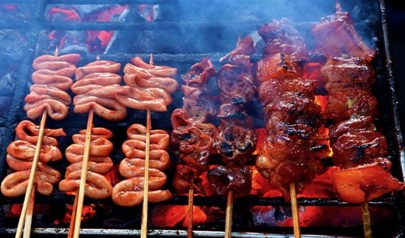 Filipino-style barbecue on a grill. Filipino-style barbecue on a grill.