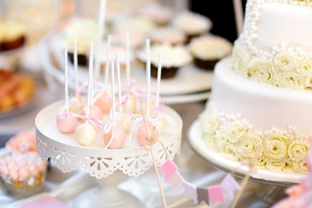 Cake pops in silvery pastel colors for an elegant wedding dessert Cake pops in silvery pastel colors for an elegant wedding dessert